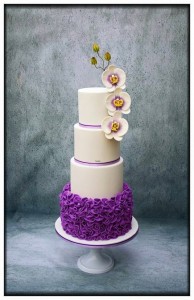 white purple wedding cake orchids